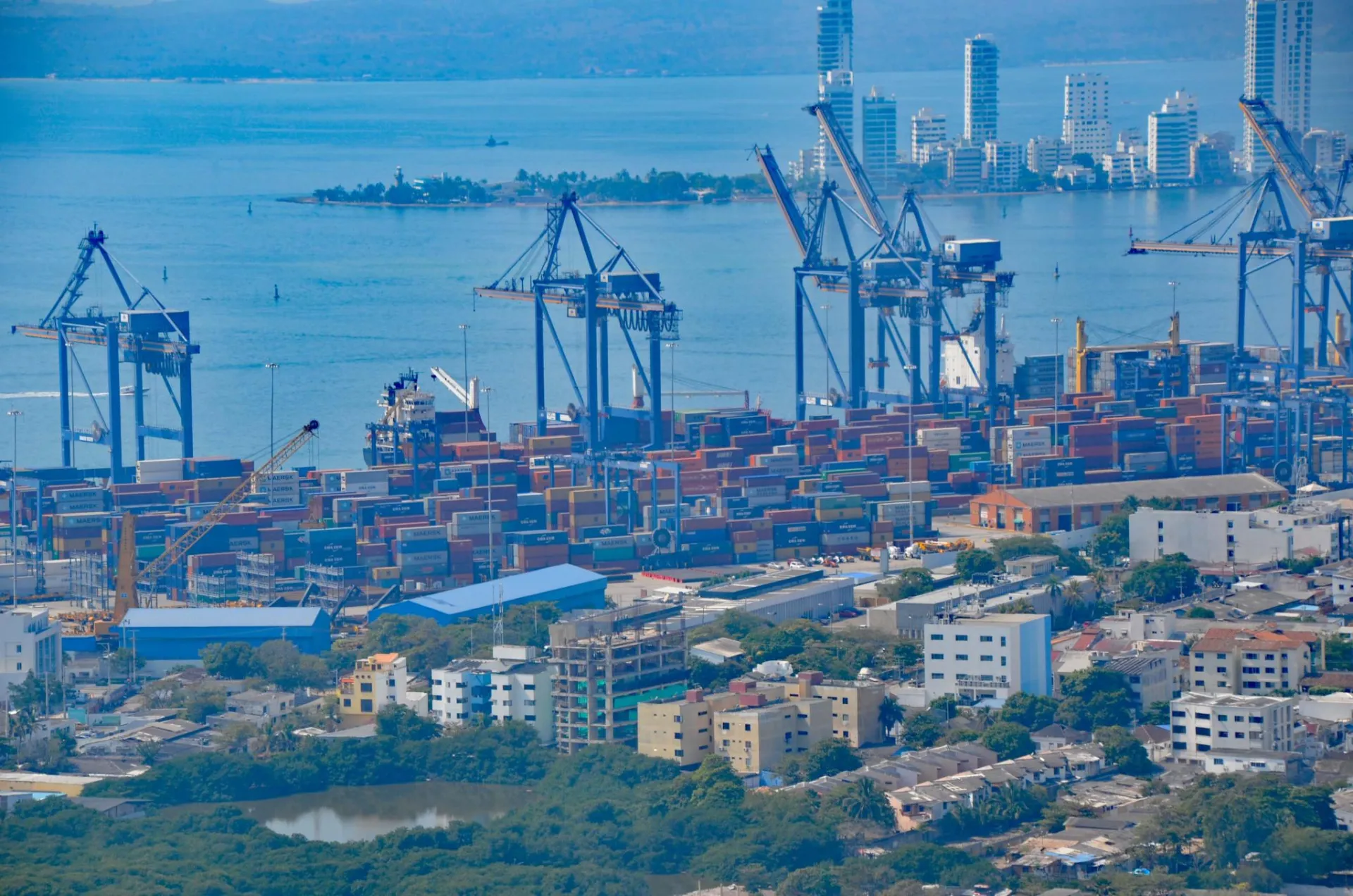 Container ship loading at the port of Cartagena, Colombia