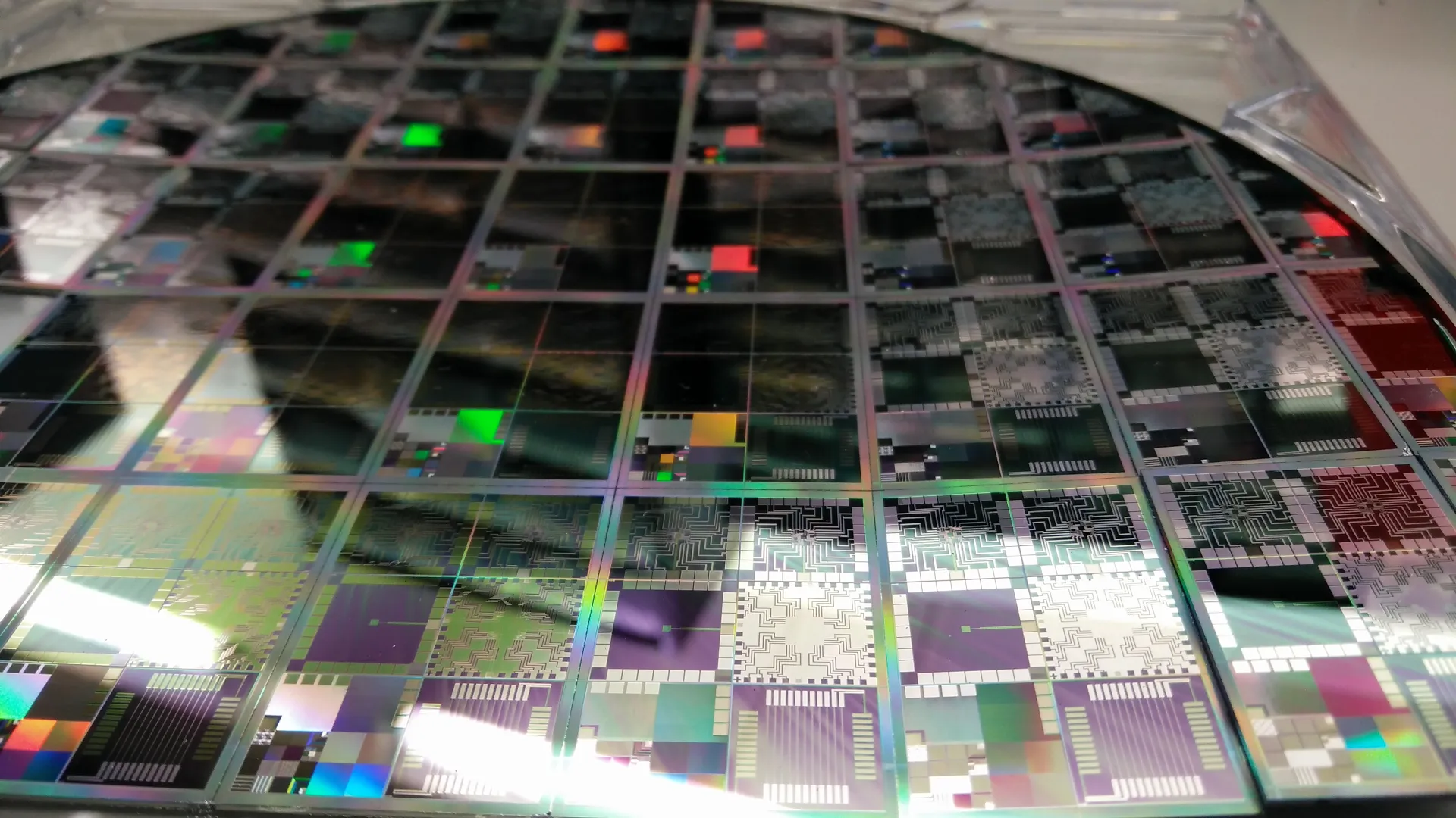 Close-up of a 12-inch semiconductor wafer with microelectronic circuits