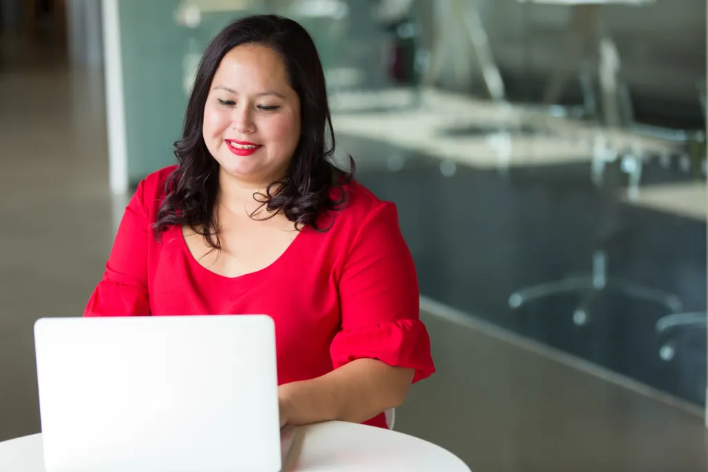 A technology professional working on a laptop